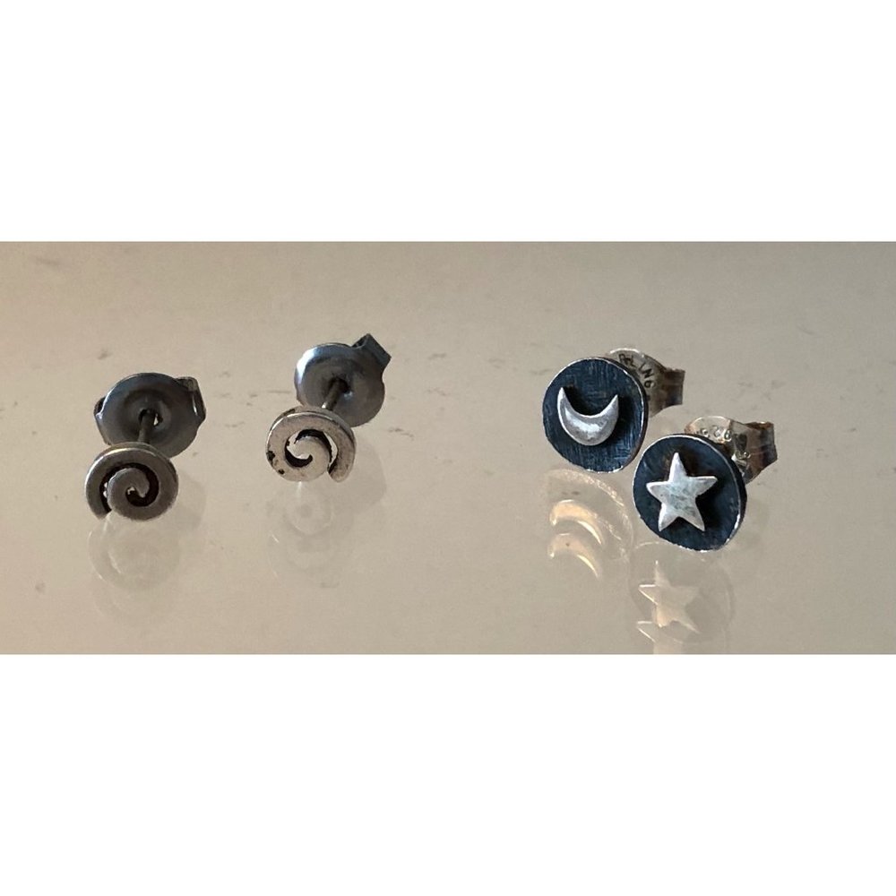 Two sets of black & silver swirl, moon & star